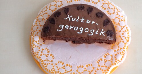 Torte mit der Aufschrift Kulturgeragogik